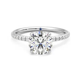 Four Prong Round Moissanite Engagement Ring with Hidden Anniversary Stone Accent Versatile Touch