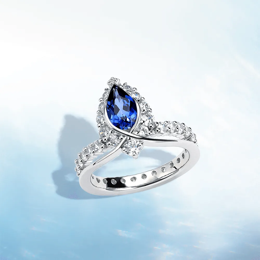 "ENDLESS BLUE" Luxe Crown Pear Shaped Sapphire Ring Sustainable Material