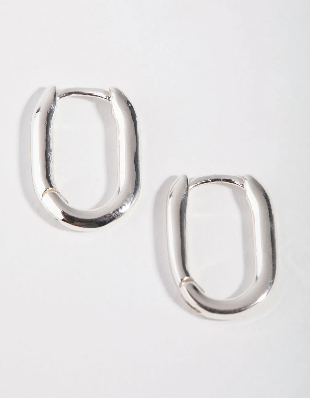 Safe product Sterling Silver Sleek Oval Huggie Earrings