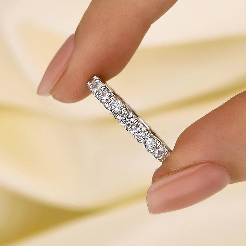 Glow Accent Louily Eternity Round Cut Simulated Diamond Wedding Band In Sterling Silver