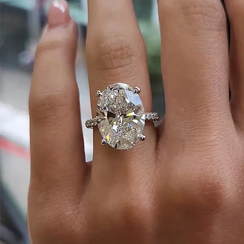 Louily Exclusive Oval Cut Simulated Diamond Engagement Ring Artful Accent