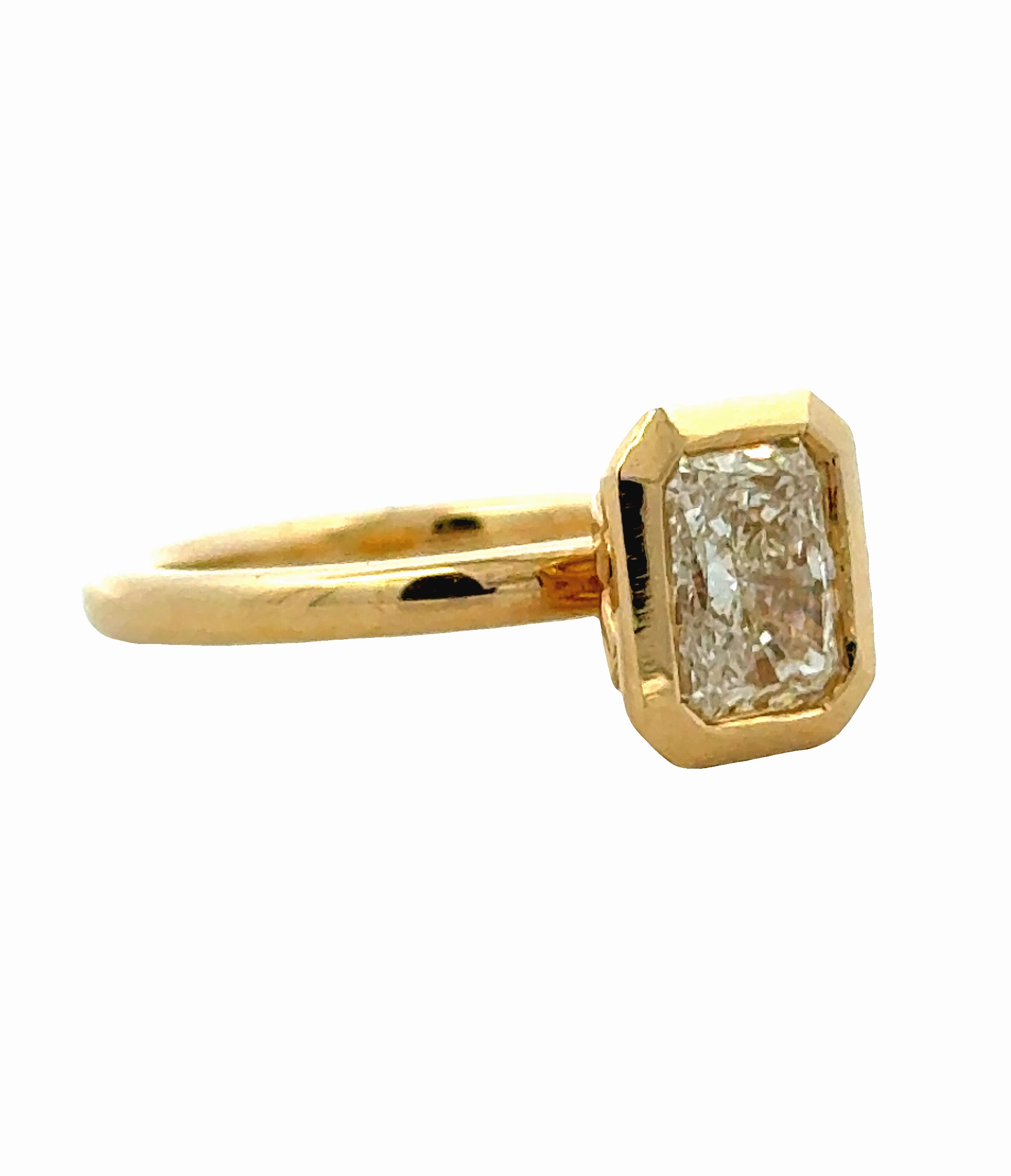 14 Karat Yellow Gold Bezel Set Radiant Cut Engagement Ring Weekend Piece