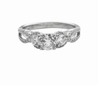 ROUND DIAMOND RING WITH DIAMONDS THROUGHOUT FREE FORM SHANK (1.27cttw) Seasonal Look