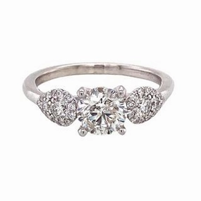 Effortless Shine ROUND DIAMOND WITH DIAMONDS SET INTO PEAR SHAPE SIDE SECTIONS