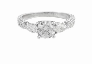 Refined Spark ROUND DIAMOND RING WITH PEAR SHAPE SIDE STONES AND DIAMONDS DOWN THE SHANK