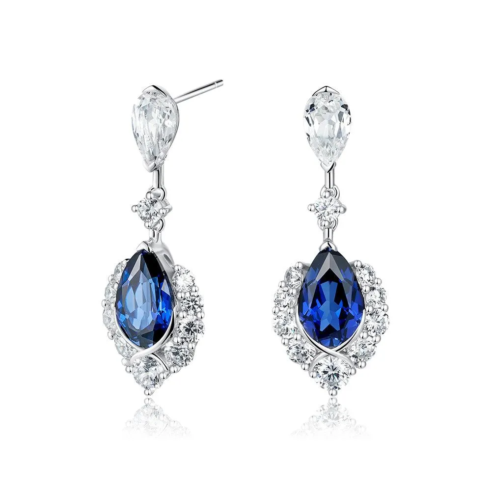 "ENDLESS BLUE" 7.26 Ctw. Pear Shaped Sapphire Earrings High-Quality Element Curved Trinket