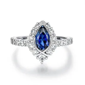 "ENDLESS BLUE" Pear Shaped Sapphire Ring Iridescent effect