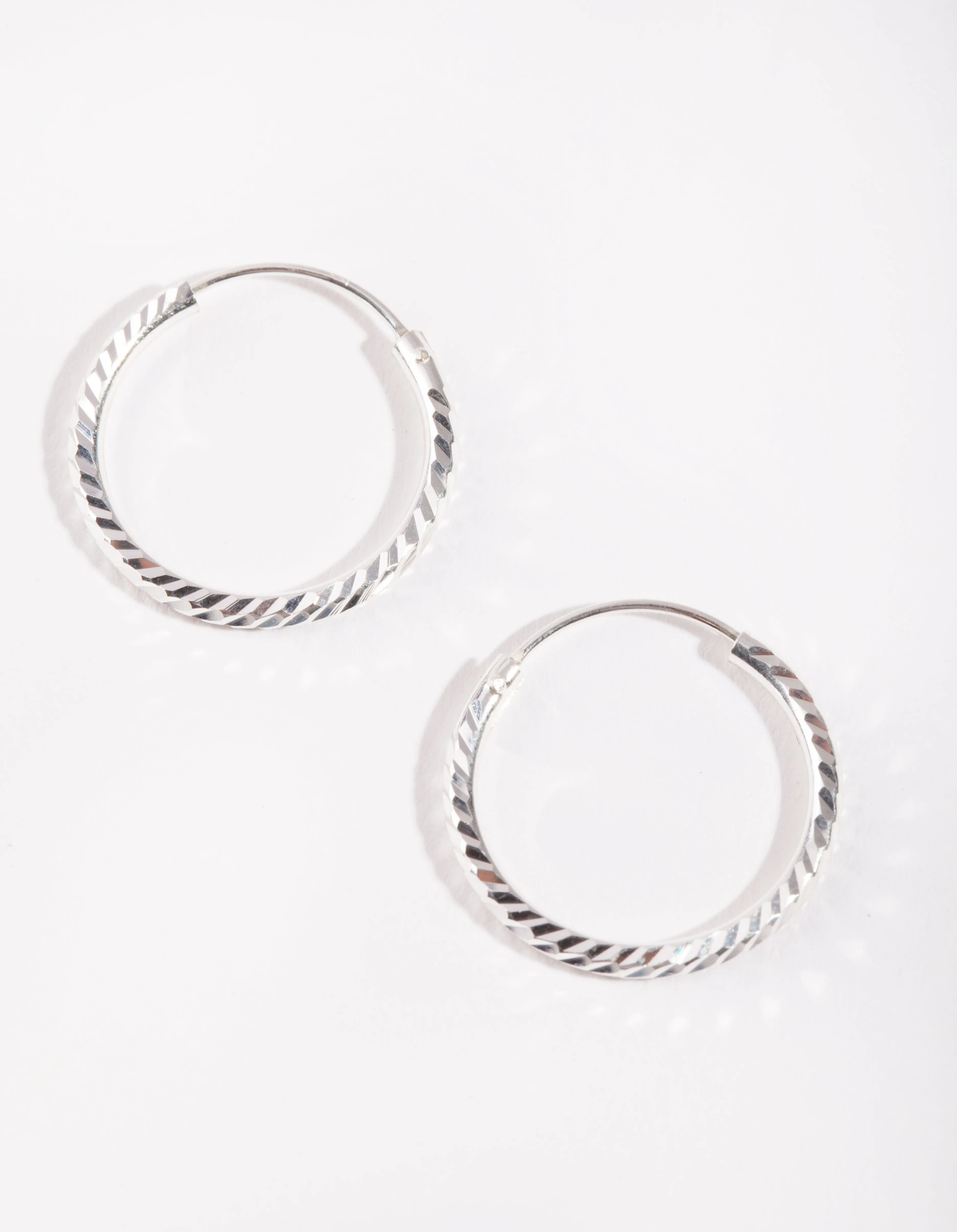 Radiant Style Sparkling Creation Sterling Silver 20mm Diamond Cut Hoop Earrings