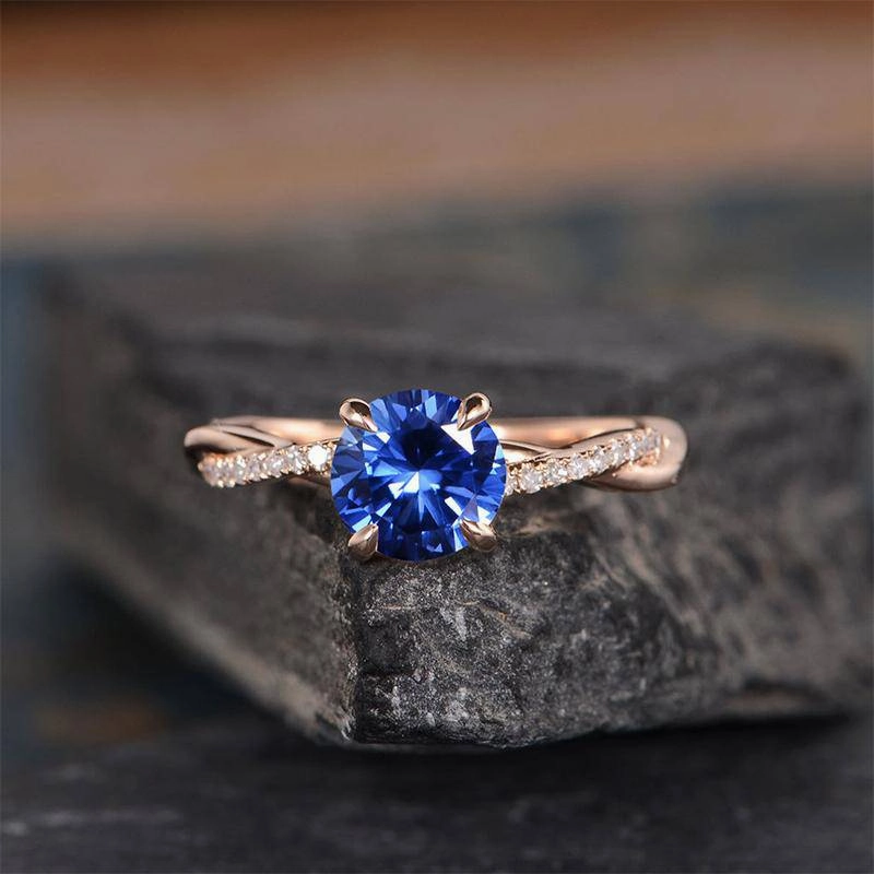 Trend Setter Louily Rose Gold Twist 1.25 Carat Blue Sapphire Round Cut Promise Ring For Her In Sterling Silver